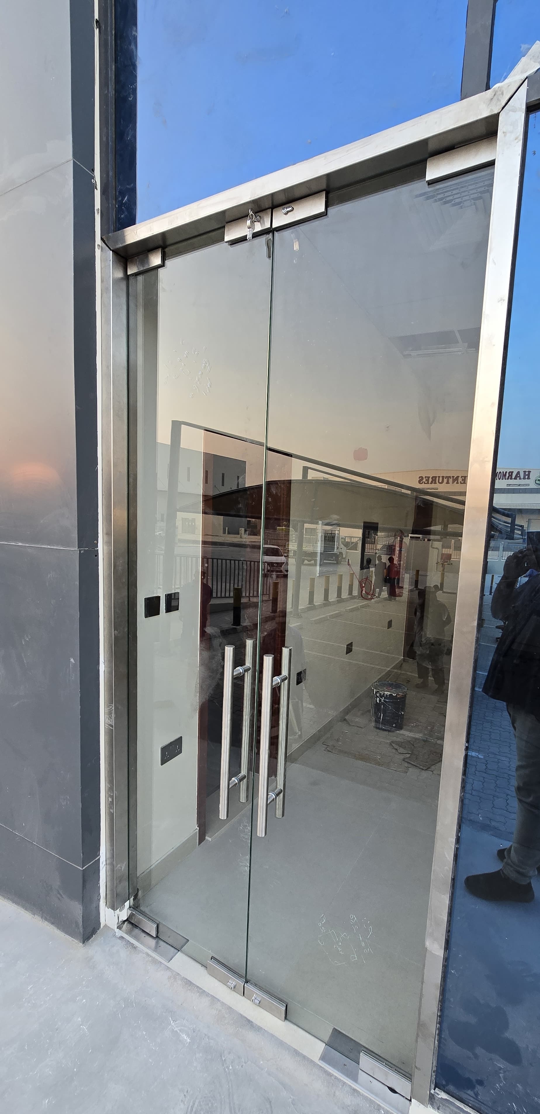       Supply and installation of a clear glass door  and repositioning of the double glass at JAFZA, DUBAI   